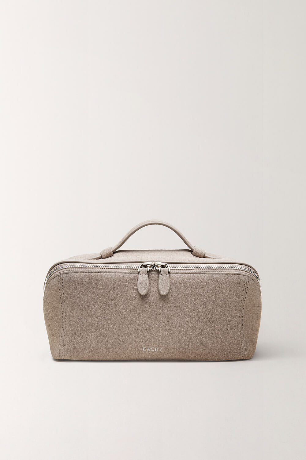 Minimalist taupe gray toiletry bag for travel essentials front view