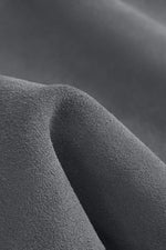 Close-up texture shot of premium soft fabric material, durable and elegant blue finish