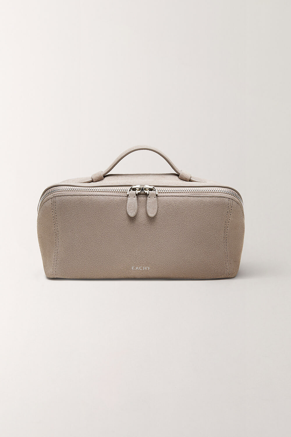 Minimalist taupe gray toiletry bag for travel essentials front view