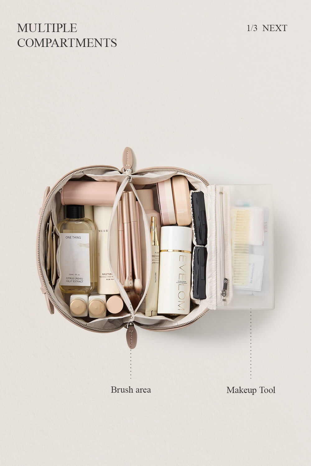 Open view of purple makeup bag storage, multi-compartment travel cosmetic bag.