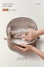 Cleaning the interior of purple makeup bag, stain-resistant travel toiletry bag.