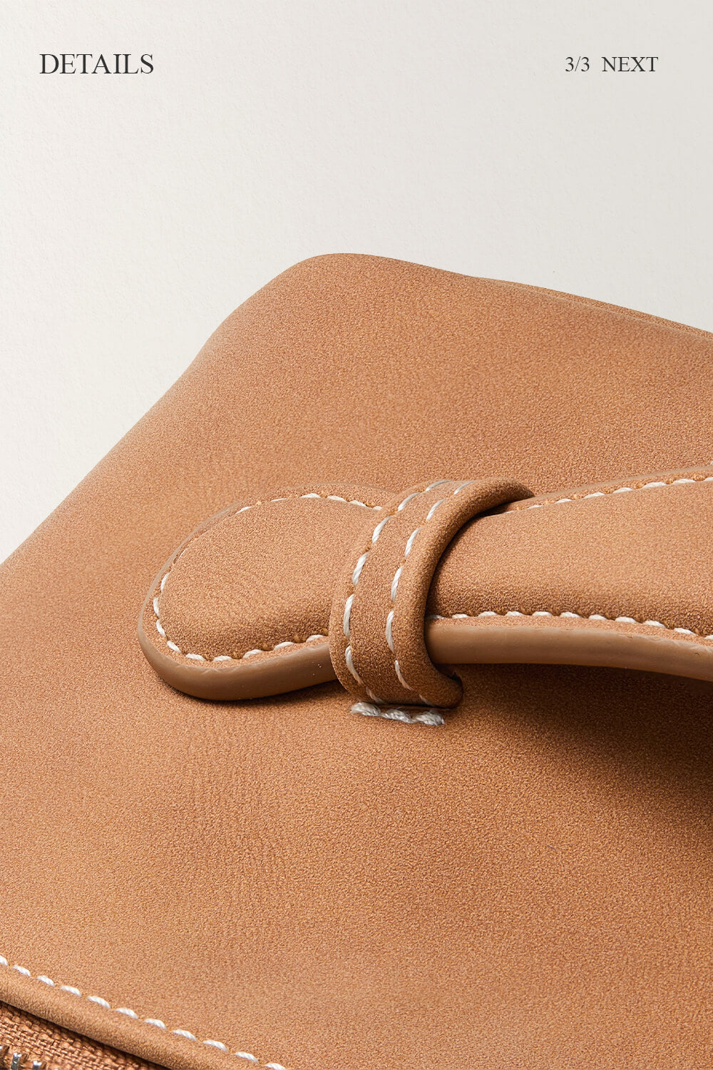 Close-up of brown makeup bag stitching detail, premium travel cosmetic bag material.