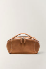 Front view of brown large capacity makeup bag, travel essential cosmetic bag.