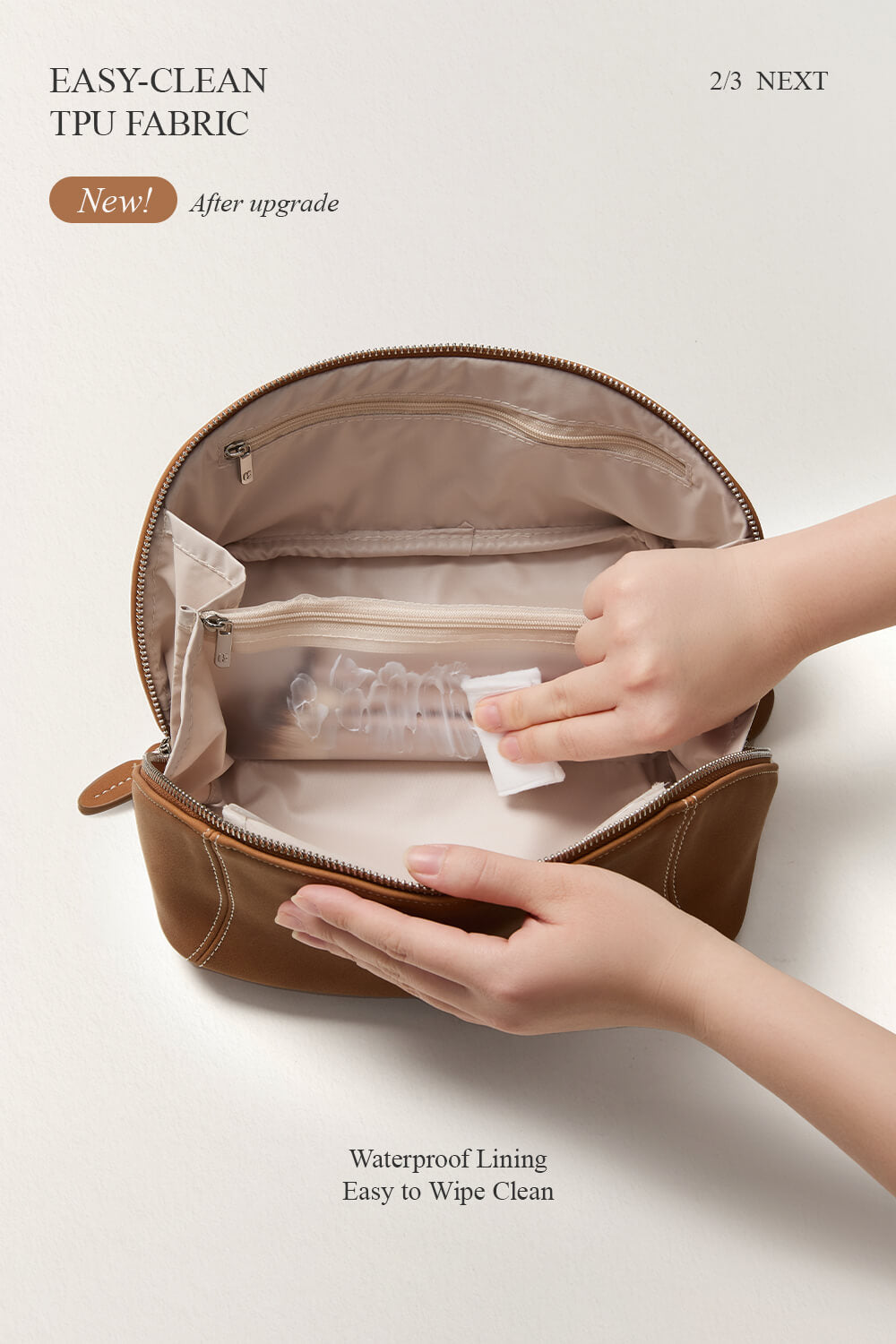Hands showing easy-to-clean lining of brown makeup bag, travel toiletry bag feature.